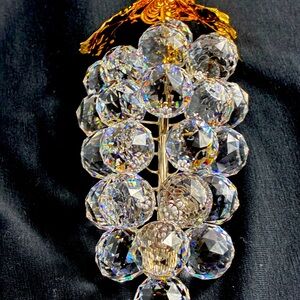 Rare Swarovski collectible vintage grapes with gold leaf.